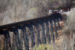 NS research and test train 90G starts across the James River trestle